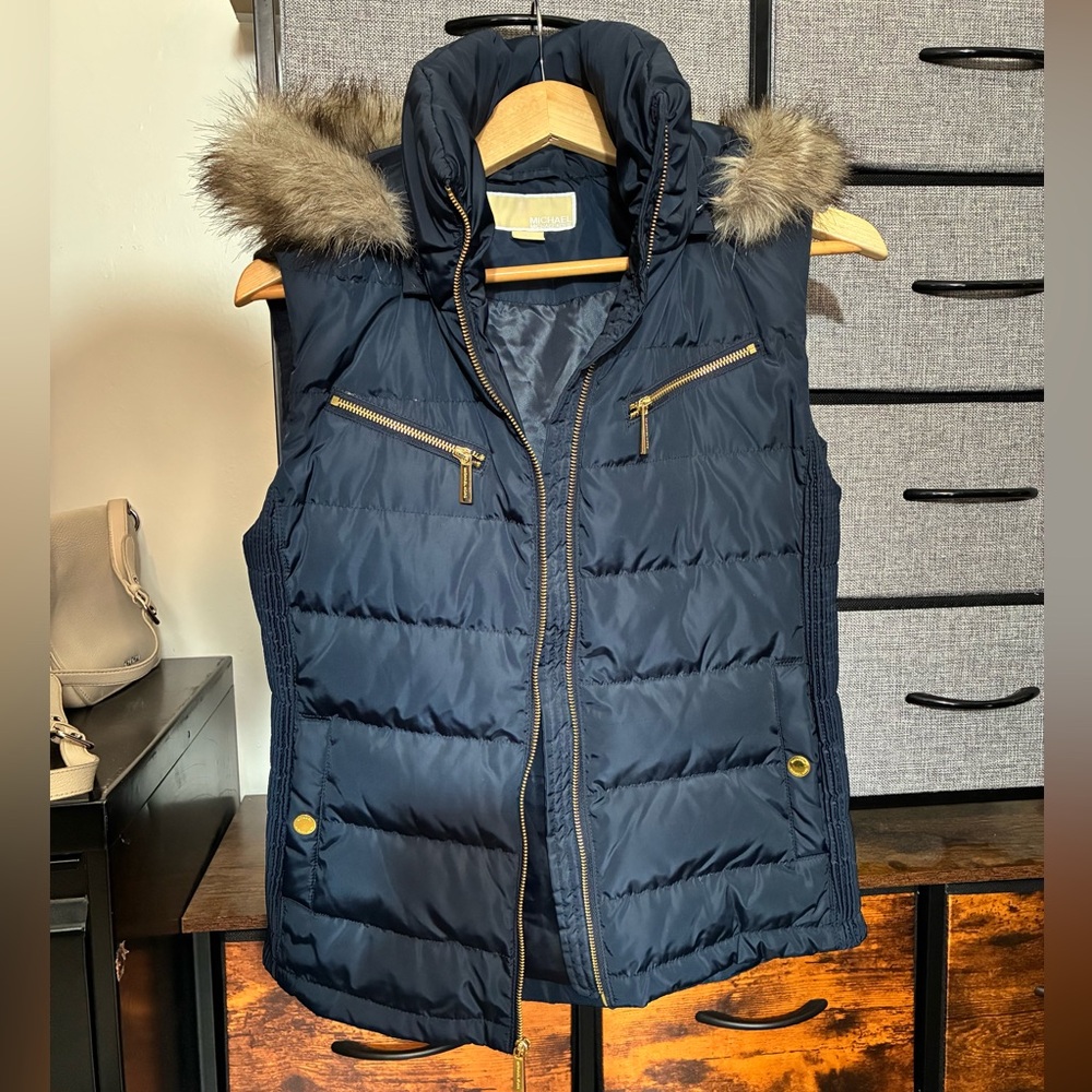 Michael Kors women's navy puffer vest with a faux fur trim, removable hood.